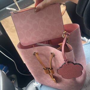 Coach powder pink bucket bag 2026 sold out authentic nwt with pouch